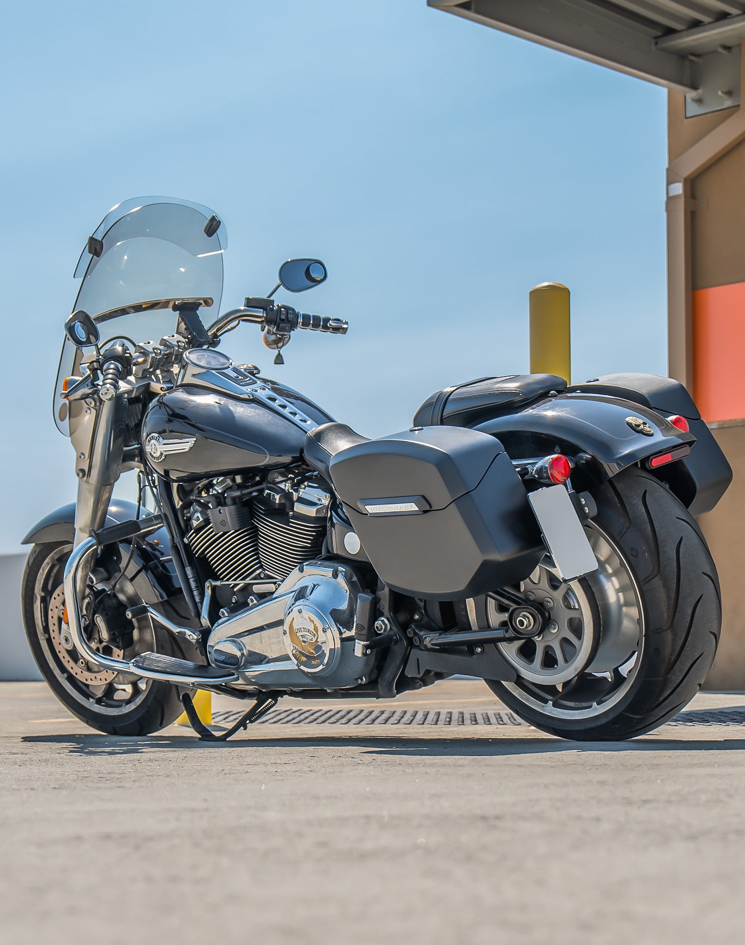 12L - Ironclad Quick Mount Medium Harley Softail Fat Boy FLFB/S Matte Hard Solo Saddlebag (Left Only) Life Style 1