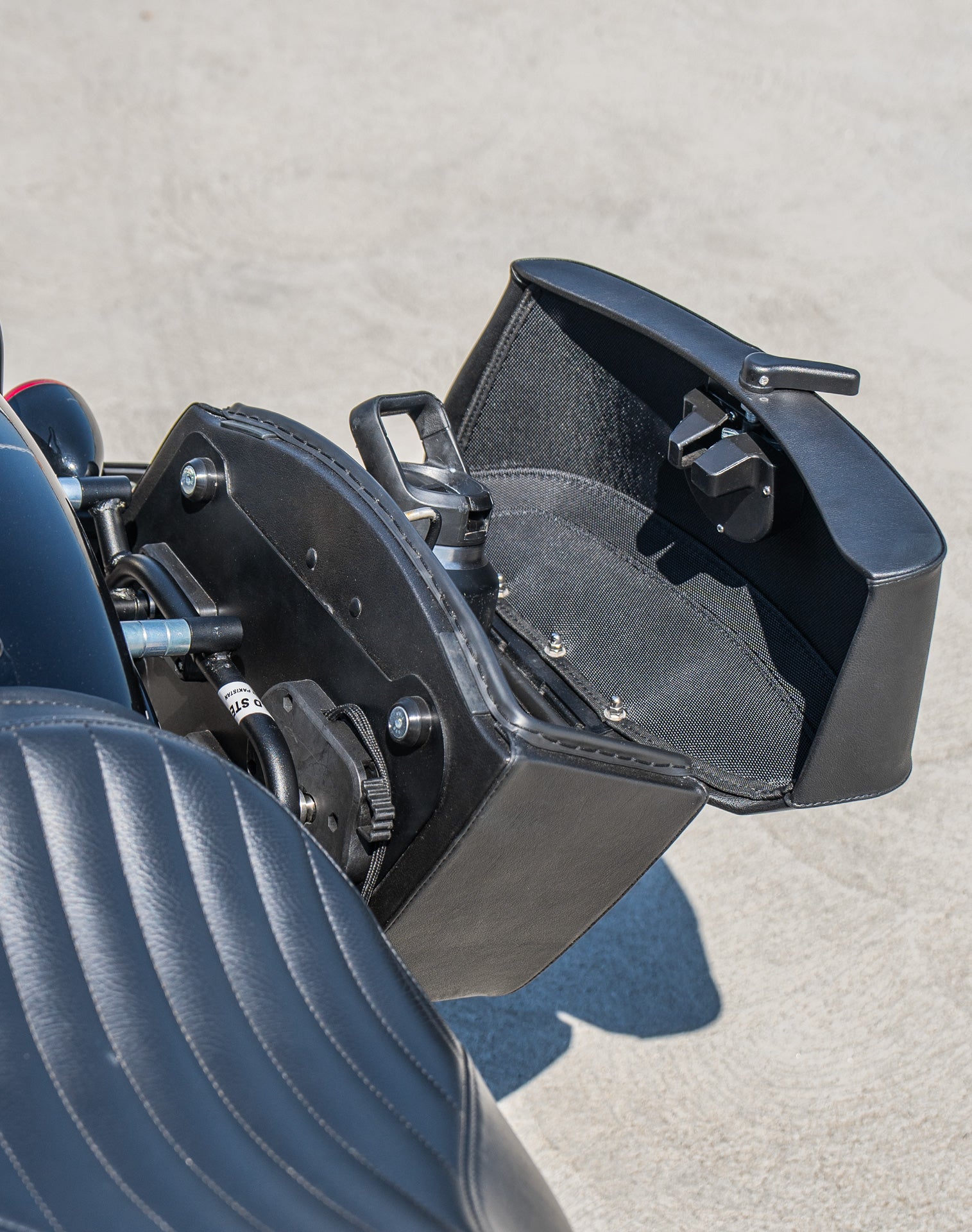 24L - Ironclad Quick-Mount Medium Harley Softail Slim FLS Leather Wrapped Hard Saddlebags Life Style 4