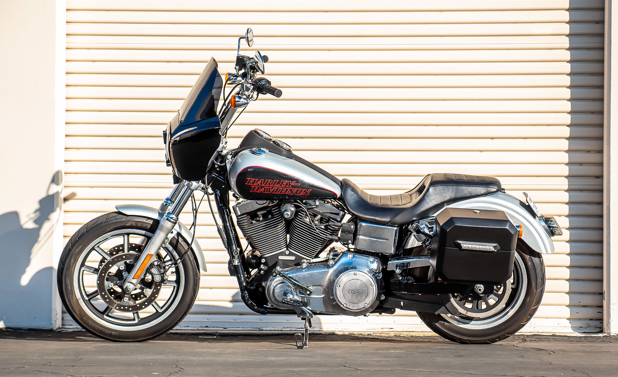 20L - Outlaw Quick-Mount Small Harley Dyna Low Rider FXDL Matte Hard Saddlebags Life Style Photo @expand