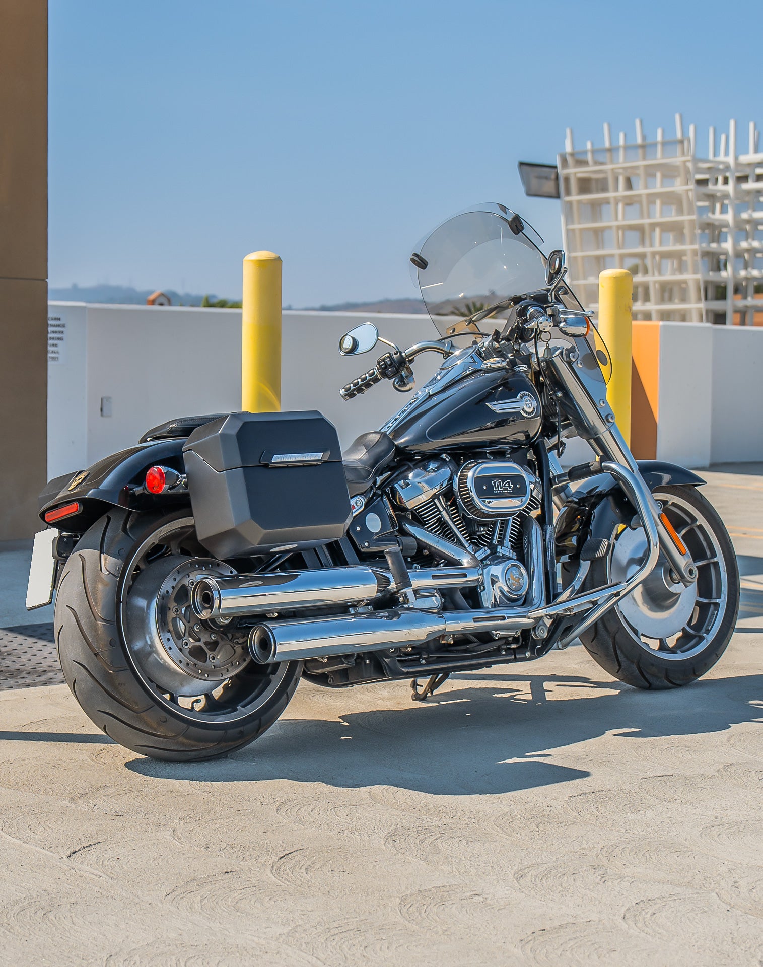 20L - Outlaw Quick-Mount Small Harley Softail Fat Boy FLFB/S Matte Hard Saddlebags Lifestyle 1