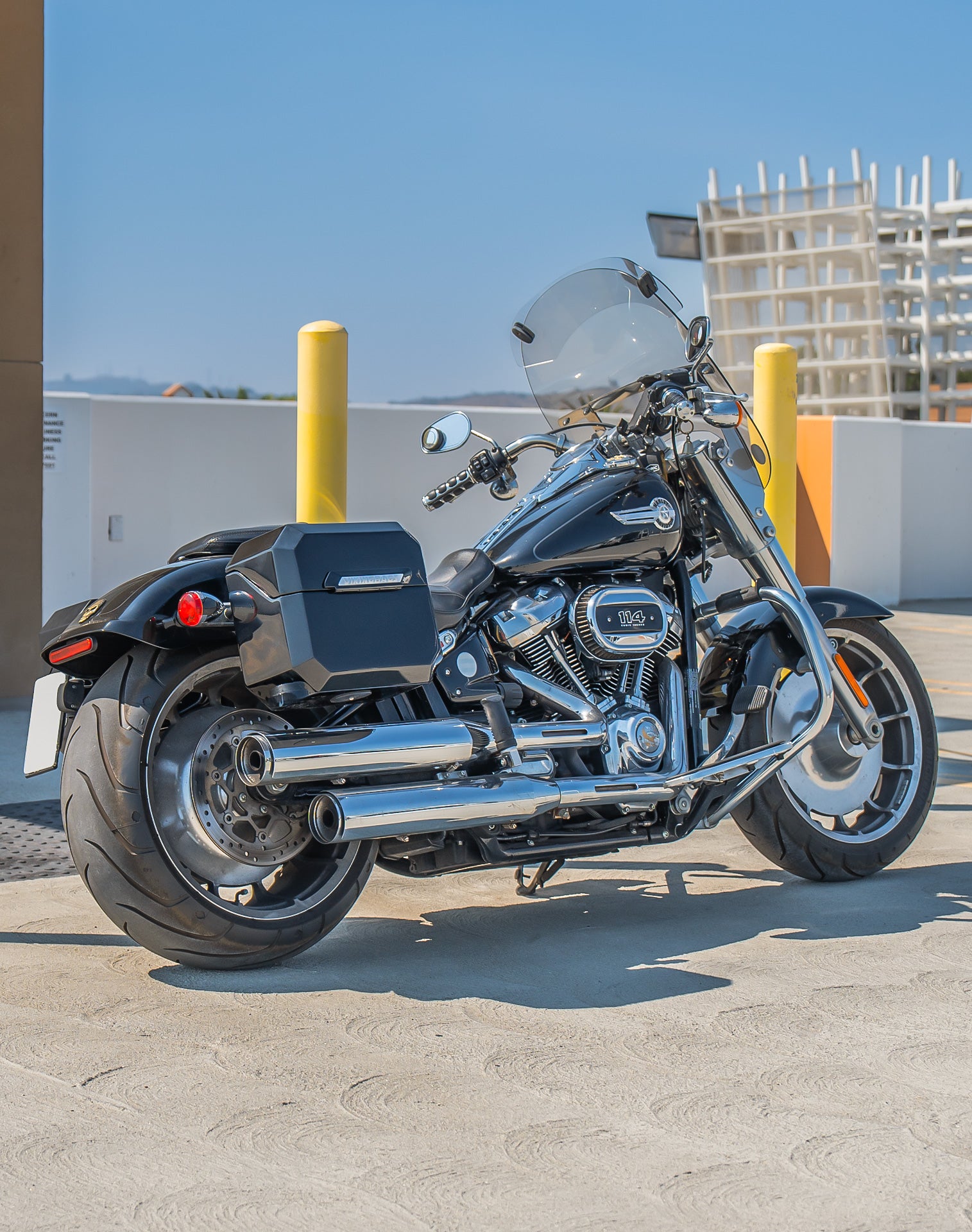 20L - Outlaw Quick-Mount Small Harley Softail Fat Boy FLFB/S Painted Hard Saddlebags Lifestyle 1