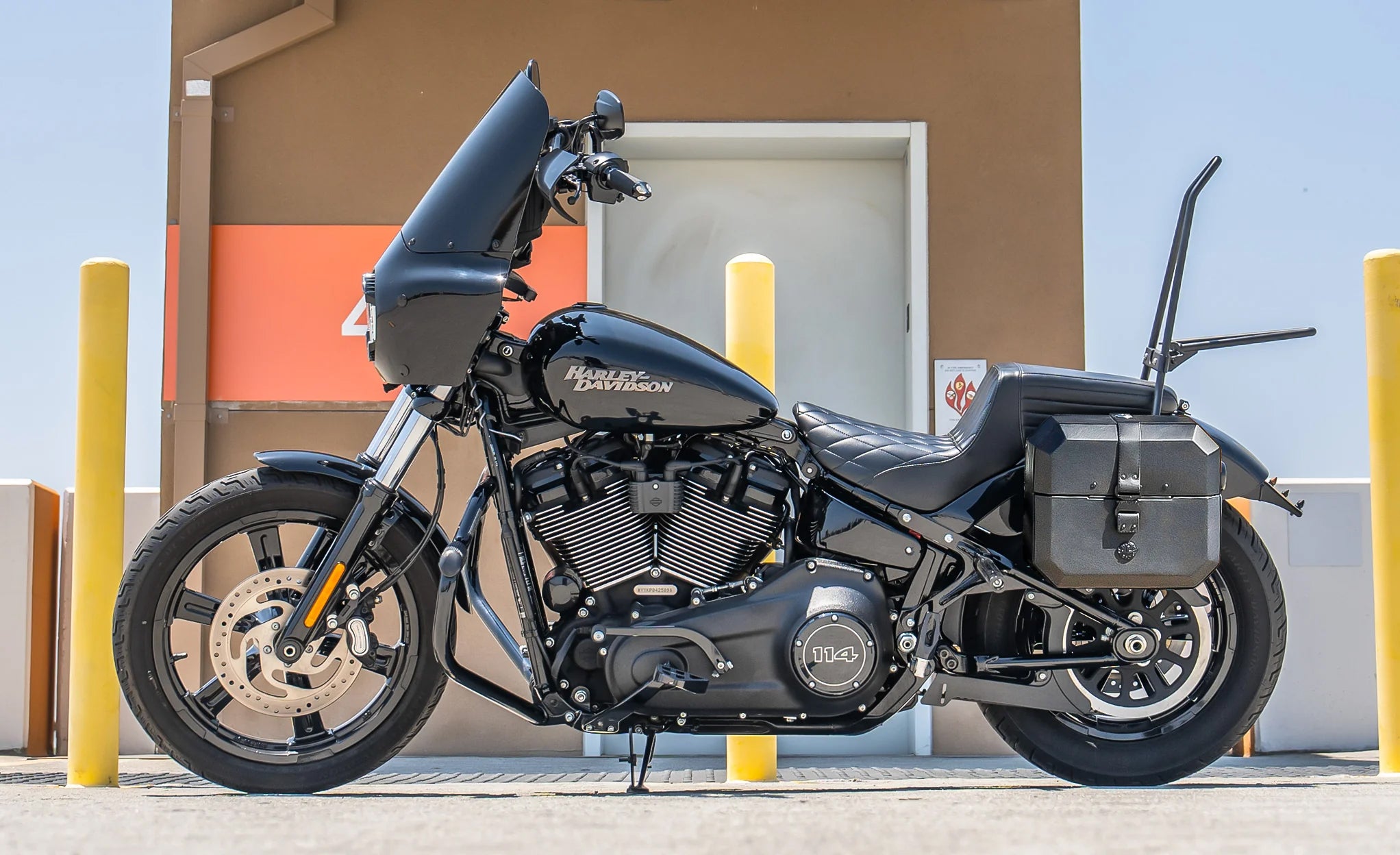 20L - Outlaw Quick-Mount Small Harley Softail Street Bob Leather Wrapped Hard Saddlebags Lifestyle Image @expand