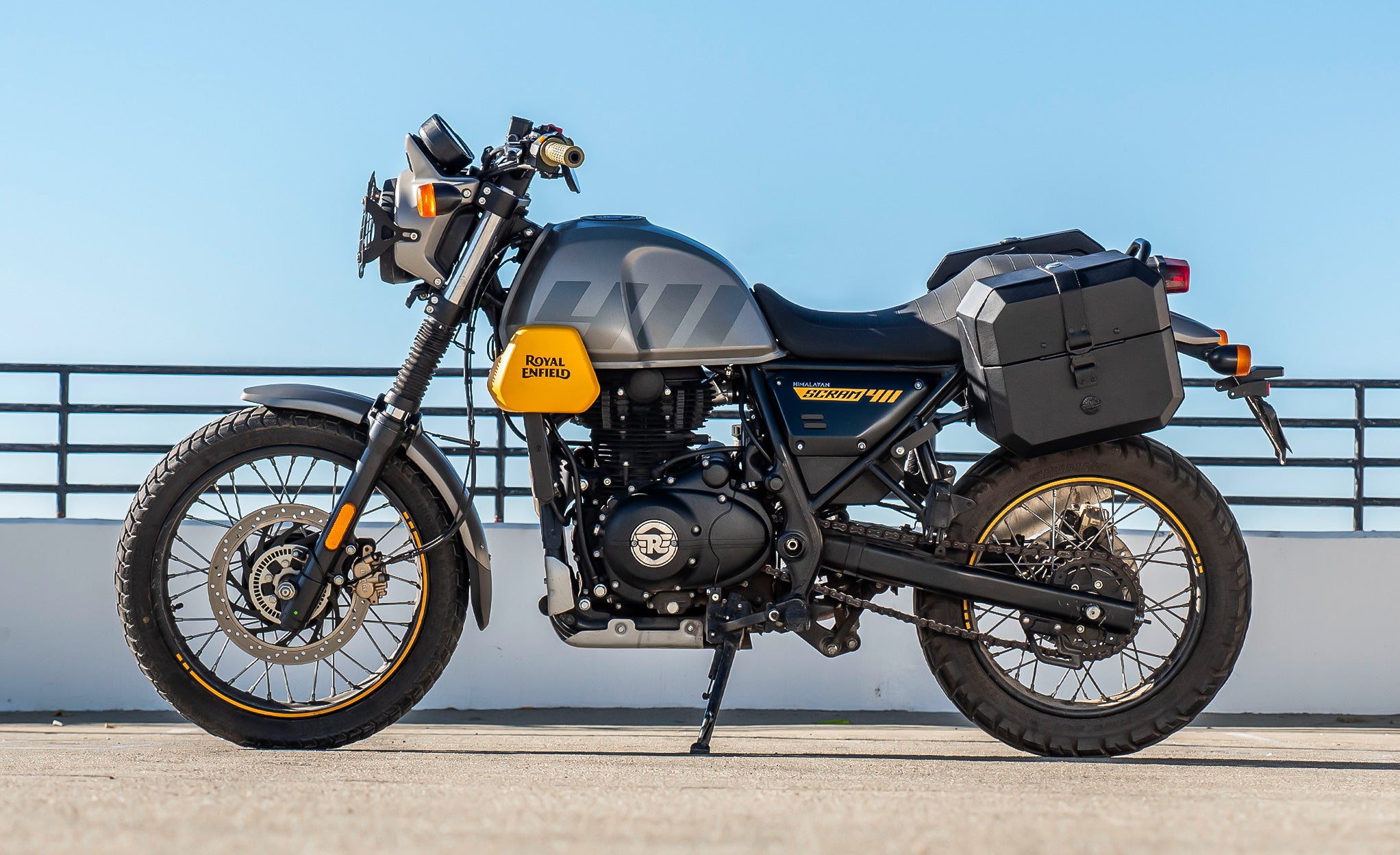 20L - Outlaw Quick-Mount Small Royal Enfield Scram 411 Leather Wrapped Hard Saddlebags Life Style Photo @expand