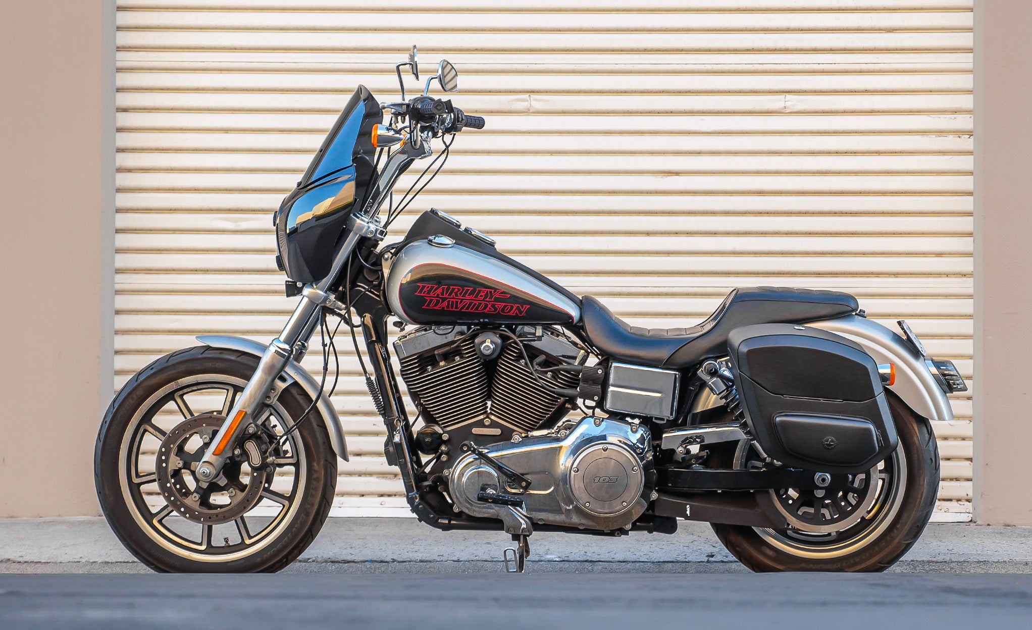 24L - Ironclad Quick-Mount Medium Harley Dyna Low Rider FXDL Leather Wrapped Hard Saddlebags Life Style Photo @expand