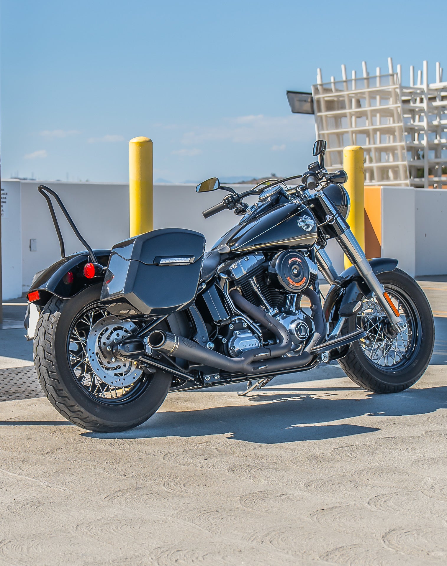 24L - Ironclad Quick-Mount Medium Harley Softail Slim FLS Painted Hard Saddlebags Life style 1