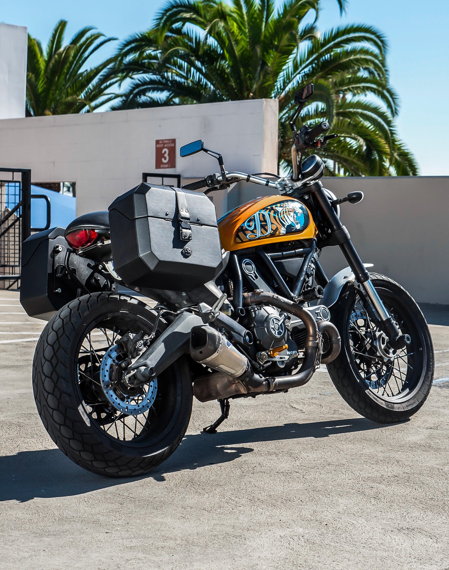 20L - Outlaw Quick-Mount Small Ducati Scrambler (2014-17) Leather Wrapped Hard Saddlebags Life Style 1