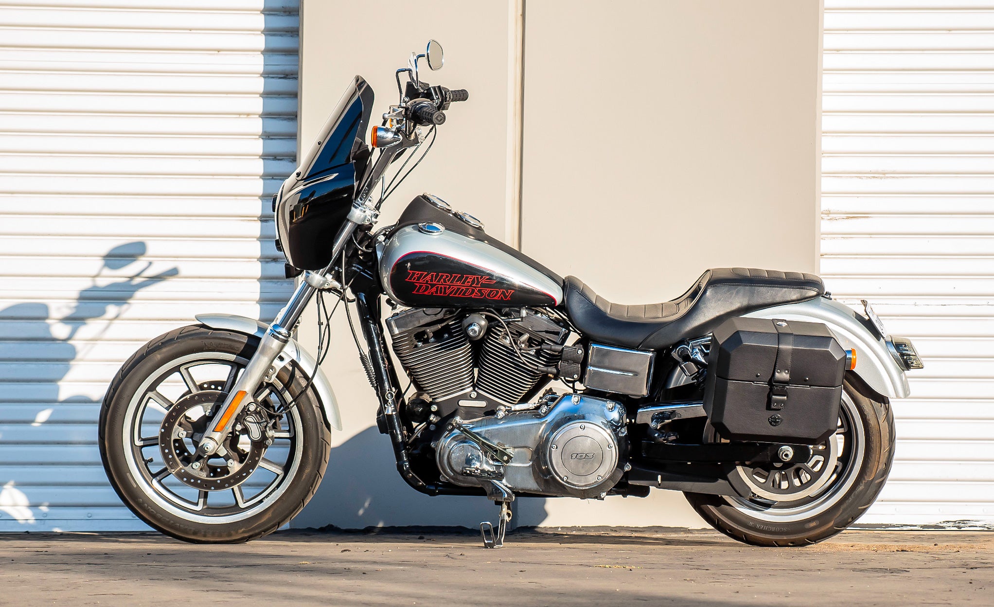 20L - Outlaw Quick-Mount Small Harley Dyna Low Rider FXDL Leather Wrapped Hard Saddlebags Life Style Photo @expand