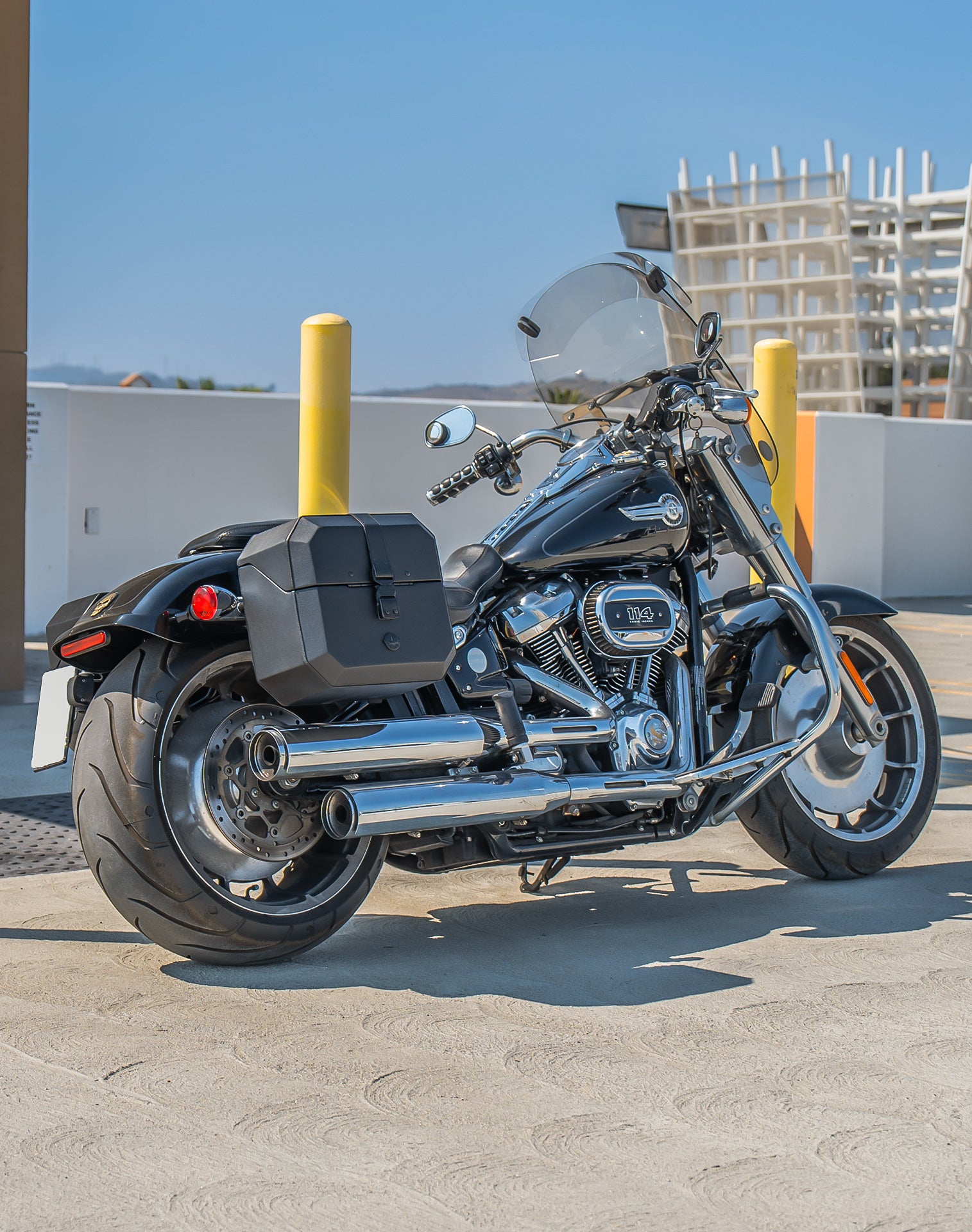 20L - Outlaw Quick-Mount Small Harley Softail Fat Boy FLFB/S Leather Wrapped Hard Saddlebags Lifestyle 1