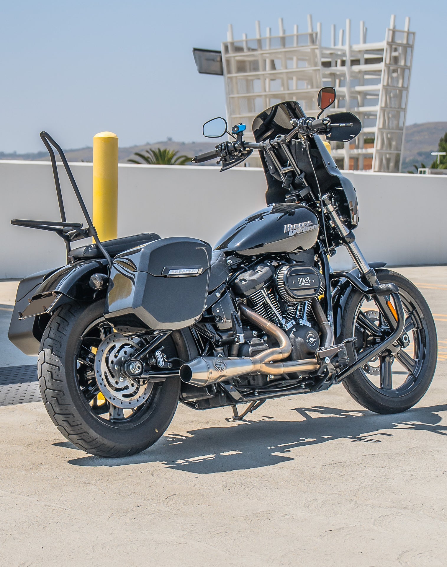 24L - Ironclad Quick-Mount Medium Harley Softail Street Bob Painted Hard Saddlebags Life style 1